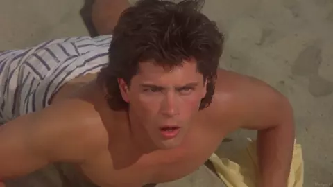 Devin DeVasquez nude - Society (1989)