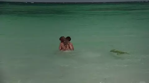 Kelly Brook flirts with the brutal young man and has hard sex in Survival Island