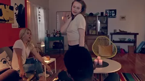 Steamy girls Tru Collins and Hayley Kiyoko have a threesome in explicit sex scene